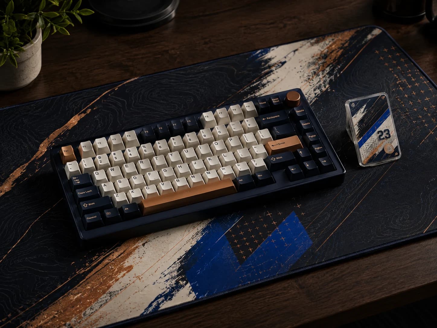 Custom desk mat and mechanical keycap set sharing one gaming identity