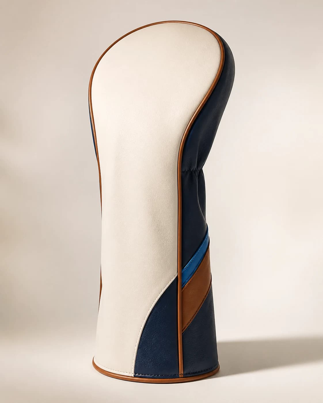 Premium custom golf driver headcover posed beside a club on a green